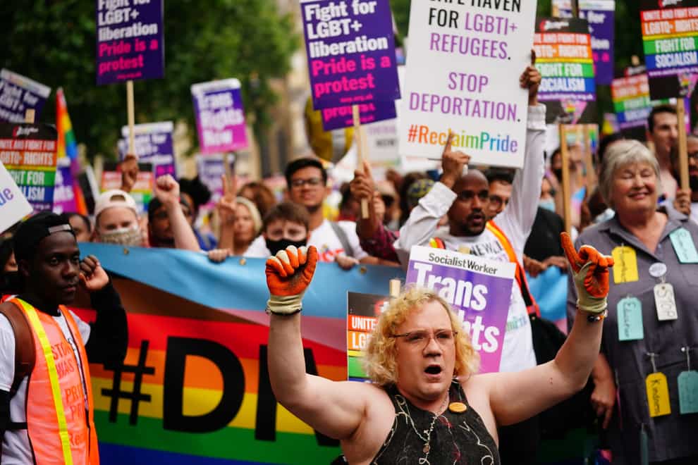 Demonstrators on a Reclaim Pride march calling on Boris Johnson to ‘stop stalling’ on LGBTI rights (Victoria Jones/PA)