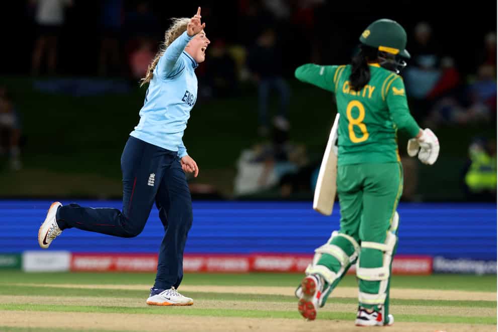 Sophie Ecclestone, left, believes England are yet to play their best cricket of this World Cup (Martin Hunter/Photosport via AP)