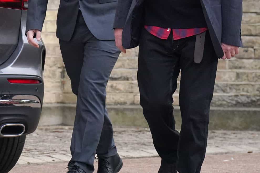 Sonny Starkey, 21, the grandson of musician Ringo Starr, accompanied by his father Jason Starkey, arriving at Wood Green Crown Court in north London (PA)