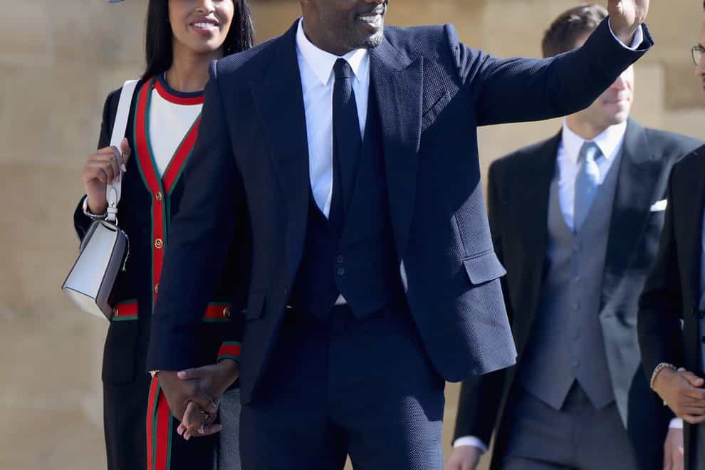Idris Elba and his wife Sabrina Dhowre at the royal wedding (Chris Jackson/PA)