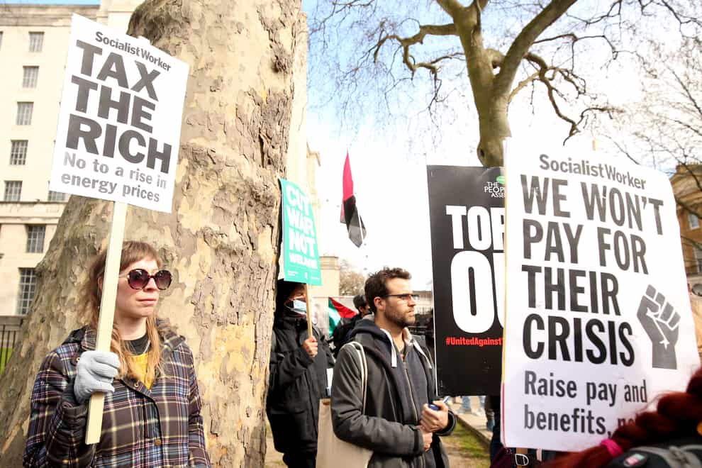 Protesters near Downing Street in central London, at The People’s Assembly Against Austerity protest to highlight those suffering hardship from the cost of living crisis due to the rise in fuel costs, food prices inflation and low pay. Picture date: Saturday April 2, 2022.