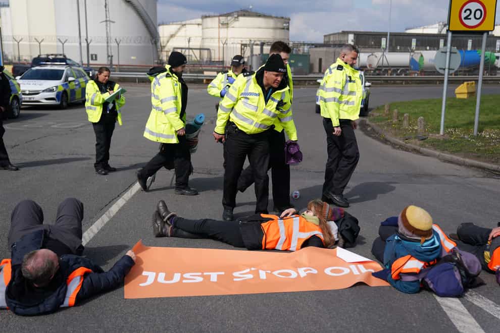 More than 200 people have been arrested as climate change activists enter a third day of protests at oil terminals (Jacob King/PA)