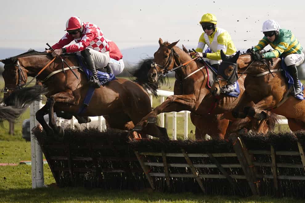 Flame Bearer (left) leads the way at Fairyhouse (Niall Carson/PA)