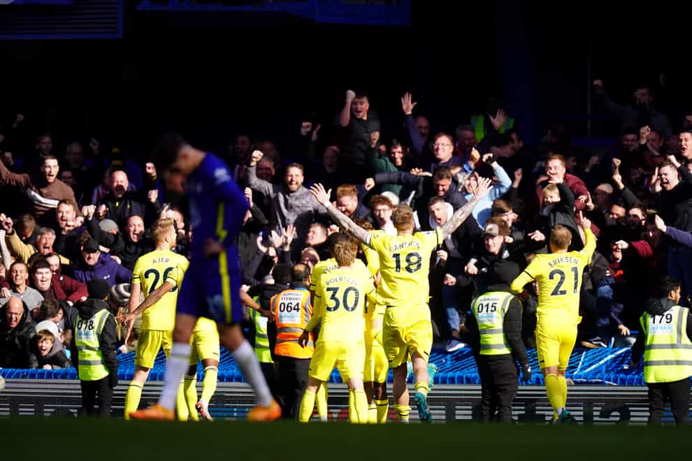 Brentford players celebrate in front of their fans after beating Chelsea 4-1 at Stamford Bridge (Adam Davy/PA)
