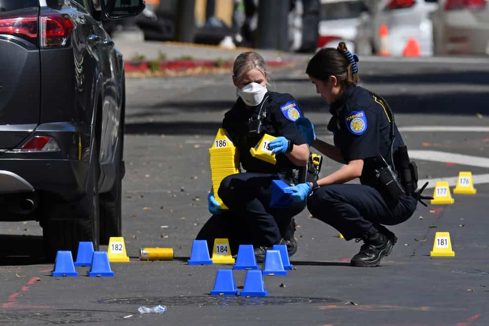 Sacramento police carry out investigations (Jose Carlos Fajardo/Bay Area News Group via AP)