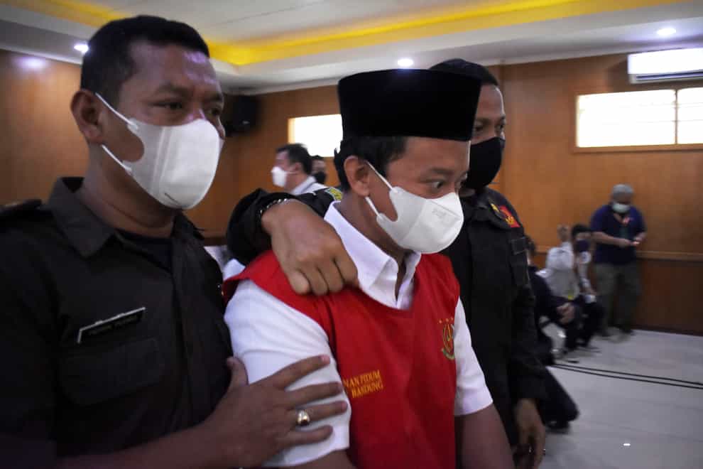 Herry Wirawan at court in Bandung (Rafi Fadh/AP)