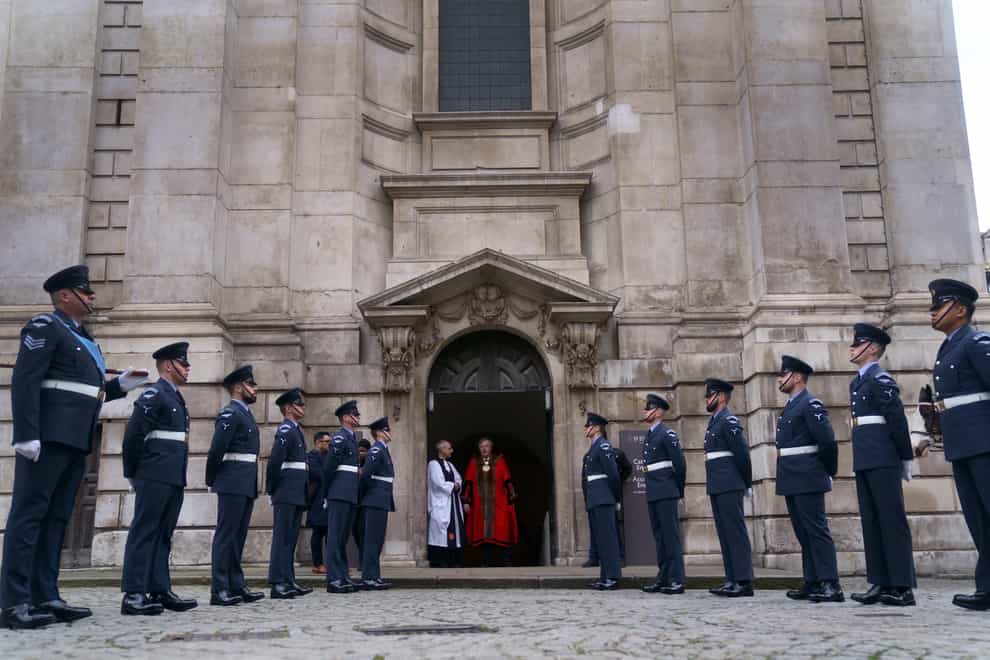 Military personnel form a Guard of Honour before the service (Victoria Jones/PA)