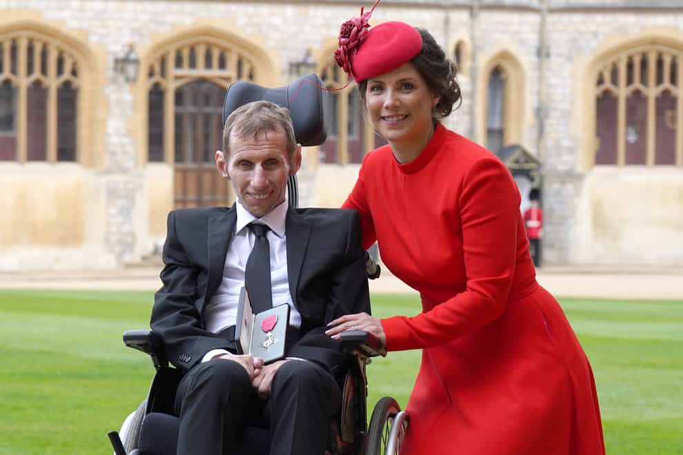Robert Burrow with his wife Lindsey after he was made an MBE by the Princess Royal (Steve Parsons/PA)