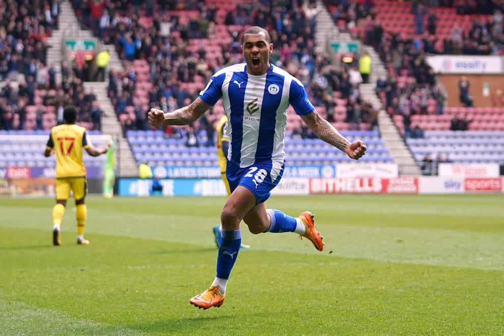 Josh Magennis was on target in Wigan’s win (PA)