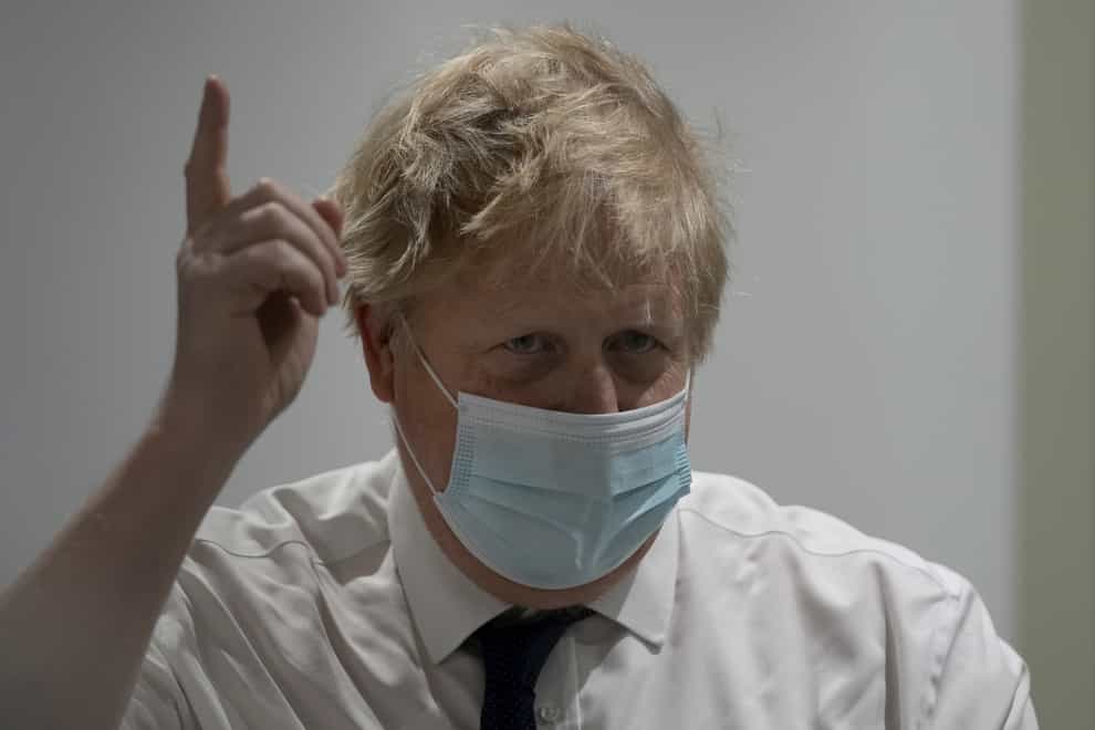 Prime Minister Boris Johnson has said he has ‘absolutely no problem’ with increasing national insurance for millions of workers in order to fund the NHS and social care (Frank Augstein/PA)