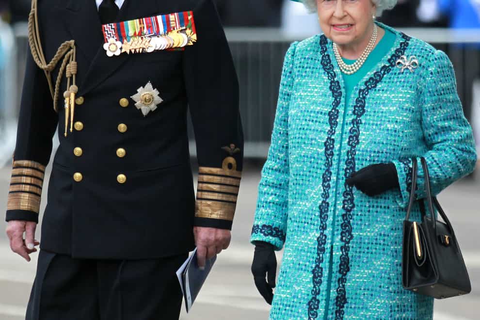 A naval uniform worn by the Duke of Edinburgh and his admiral’s cap are to go on display for the first time on the first anniversary of his death (Andrew/Milligan/PA)