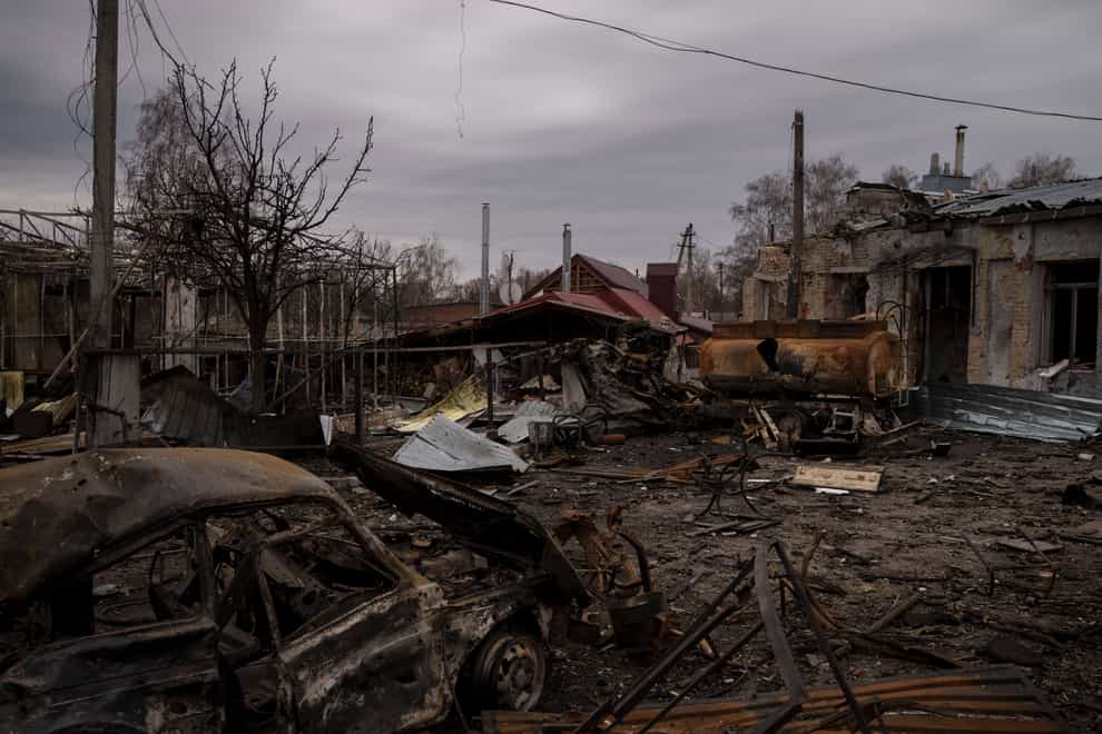 Destroyed vehicles and buildings in Ukraine (Felipe Dana/AP)