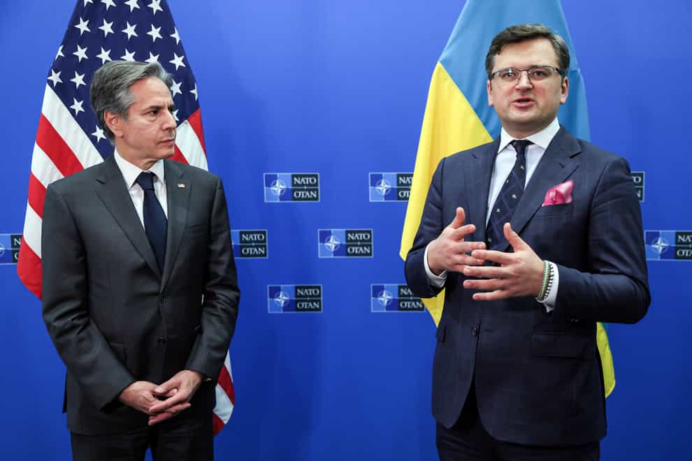 U.S. Secretary of State Antony Blinken listens as Ukraine’s Foreign Minister Dmytro Kuleba speaks following a meeting of NATO foreign ministers at NATO headquarters in Brussels, Thursday, April 7, 2022. (Evelyn Hockstein/Pool Photo via AP)