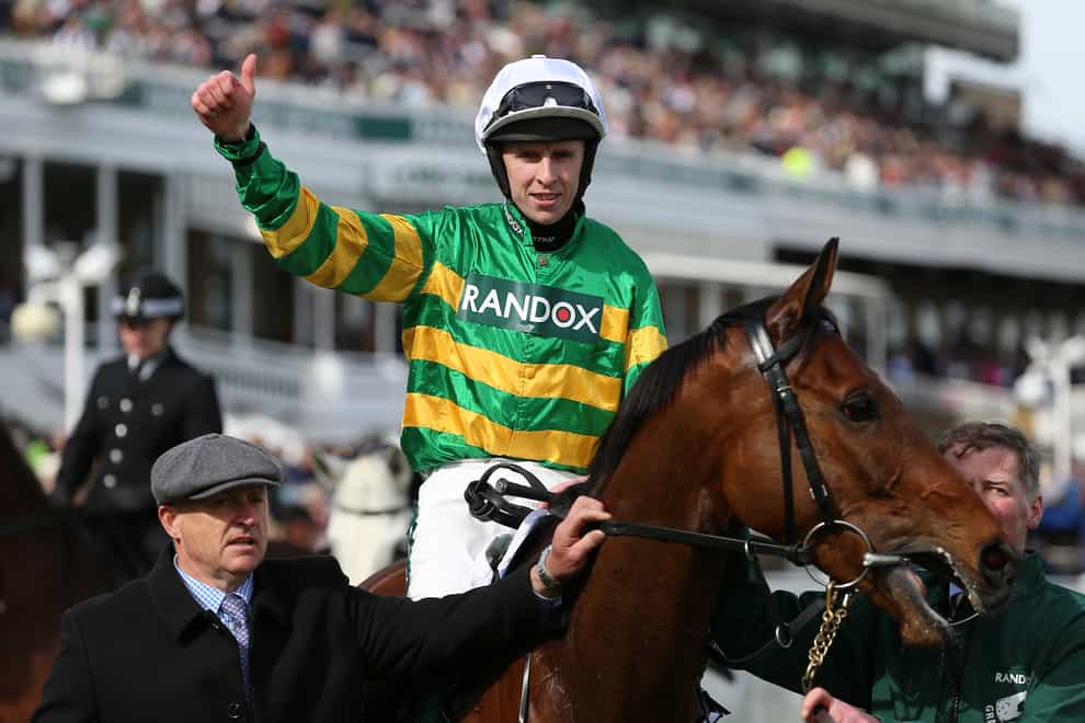 Fakir D’Oudairies and jockey Mark Walsh after winning the Marsh Chase during Ladies Day of the Randox Health Grand National Festival 2022 at Aintree Racecourse, Liverpool. Picture date: Friday April 8, 2022.