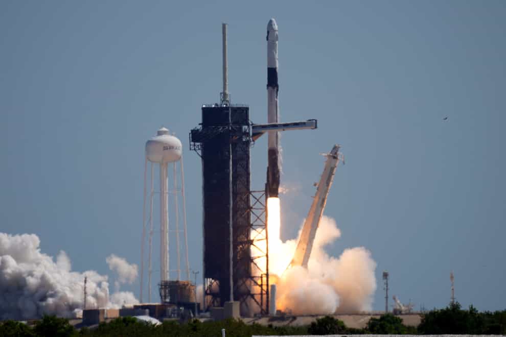 A SpaceX Falcon 9 rocket with the Crew Dragon capsule attached, lifts off with the first private crew from Launch Complex 39A Friday, April 8, 2022, at the Kennedy Space Center in Cape Canaveral, Fla. . (AP Photo/Chris O’Meara)