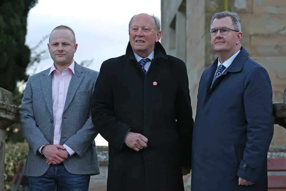 (Left-right) Jamie Bryson, Jim Allister and DUP leader Sir Jeffrey Donaldson during a rally in opposition to the Northern Ireland Protocol at Brownlow House in Lurgan, County Armagh. Picture date: Friday April 8, 2022.