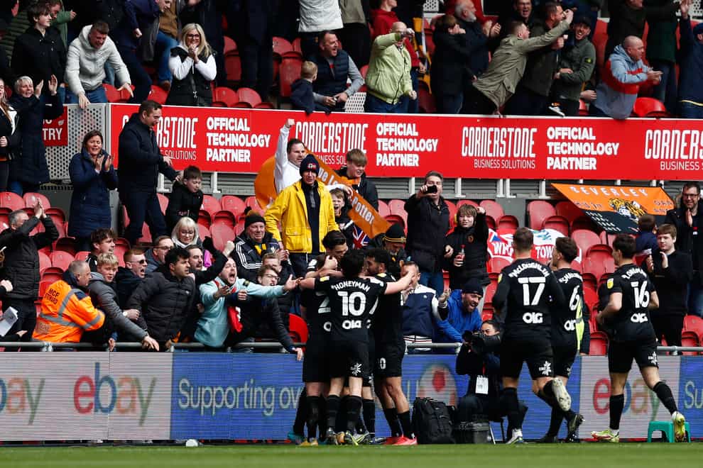 Hull celebrate Keane Lewis-Potter’s winner against Middlesbrough (Will Matthews/PA).