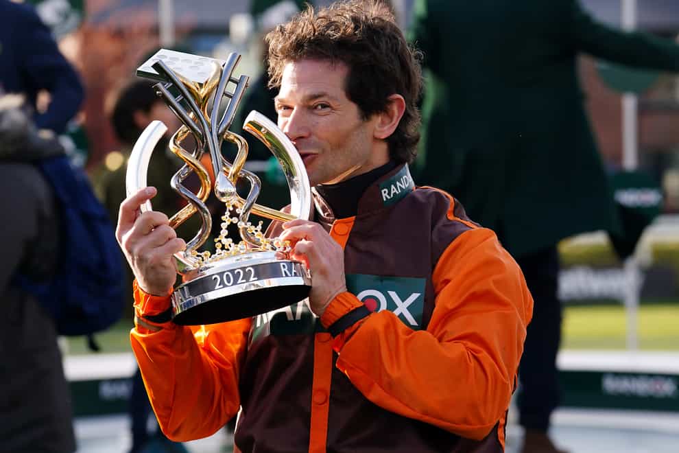 Jockey Sam Waley-Cohen with the trophy after winning the Randox Grand National Handicap Chase on Noble Yeats during Grand National Day of the Randox Health Grand National Festival 2022 at Aintree Racecourse, Liverpool. Picture date: Saturday April 9, 2022.