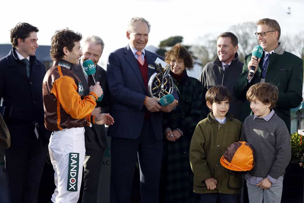 Emmet Mullins with Sam Waley-Cohen and his dad, Robert (Steven Paston/PA)