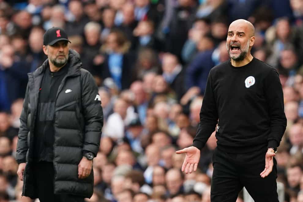 Manchester City manager Pep Guardiola (right) and Liverpool boss Jurgen Klopp saw their sides produce a high-quality 2-2 draw at the Etihad Stadium (Martin Rickett/PA)