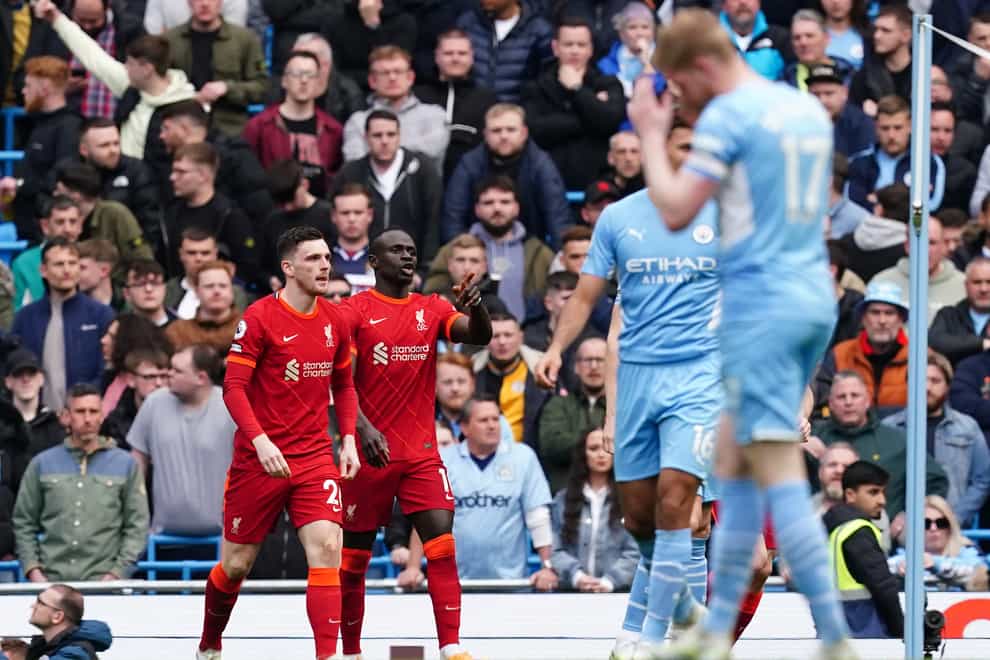 Liverpool came from behind twice to earn a point in their vital clash at Manchester City (Martin Rickett/PA)