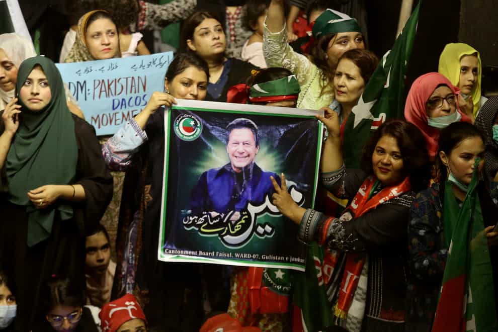 Supporters of deposed Prime Minister Imran Khan’s party participate in a rally to condemn the ousting of their leader, in Karachi, Pakistan, Sunday, April 10, 2022. With the parliamentary no-confidence vote against Khan early Sunday, he called on supporters to take to the streets in protest and the political opposition preparing to install his replacement. (Fareed Khan/AP)