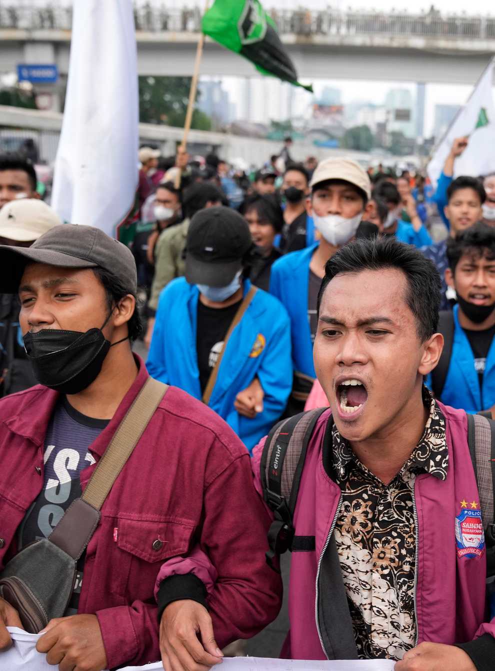Students shout slogans during a rally outside the parliament in Jakarta, Indonesia, Monday, April 11, 2022. Thousands of students marched in cities around Indonesia on Monday to protest against rumors that the government is considering postponing the 2024 presidential election to allow President Joko Widodo to remain in office beyond the two-term legal limit, calling it a threat to the country’s democracy. (AP Photo/Dita Alangkara)