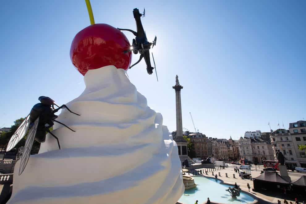 Artist Heather Phillipson unveils her artwork entitled The End on Trafalgar Square’s Fourth Plinth (David Parry/PA)