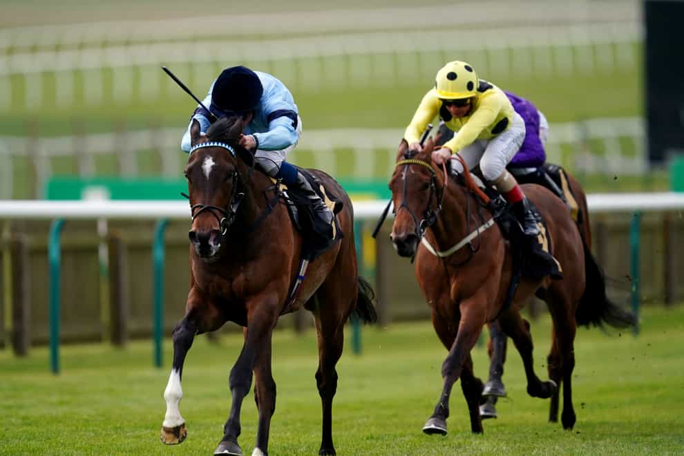 Cachet ridden by jockey William Buick (left) on their way to winning the Lanwades Stud Nell Gwyn Stakes on day one of the bet365 Craven Meeting at Newmarket (David Davies/PA)