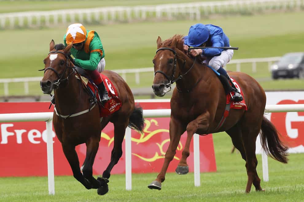 Lone Eagle (left) was a gutsy runner-up to Hurricane Lane (right) in the Irish Derby (Lorraine O’Sullivan/PA)