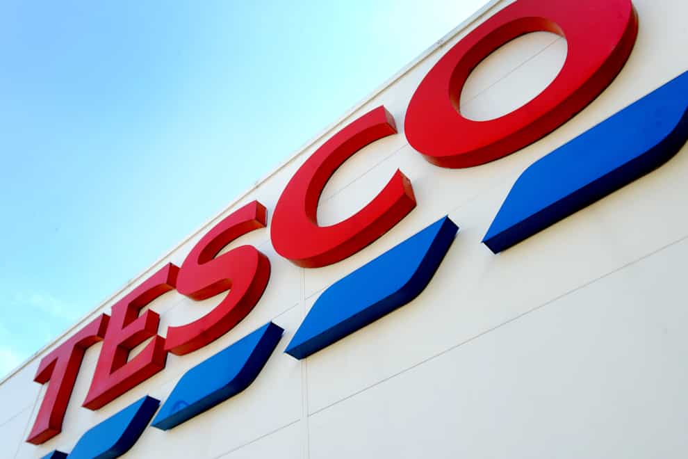 Tesco has revealed annual profits more than tripled, but warned retail earnings will come under pressure this year from soaring inflation and as shoppers return to pre-pandemic shopping habits (Nicholas T Ansell/PA)