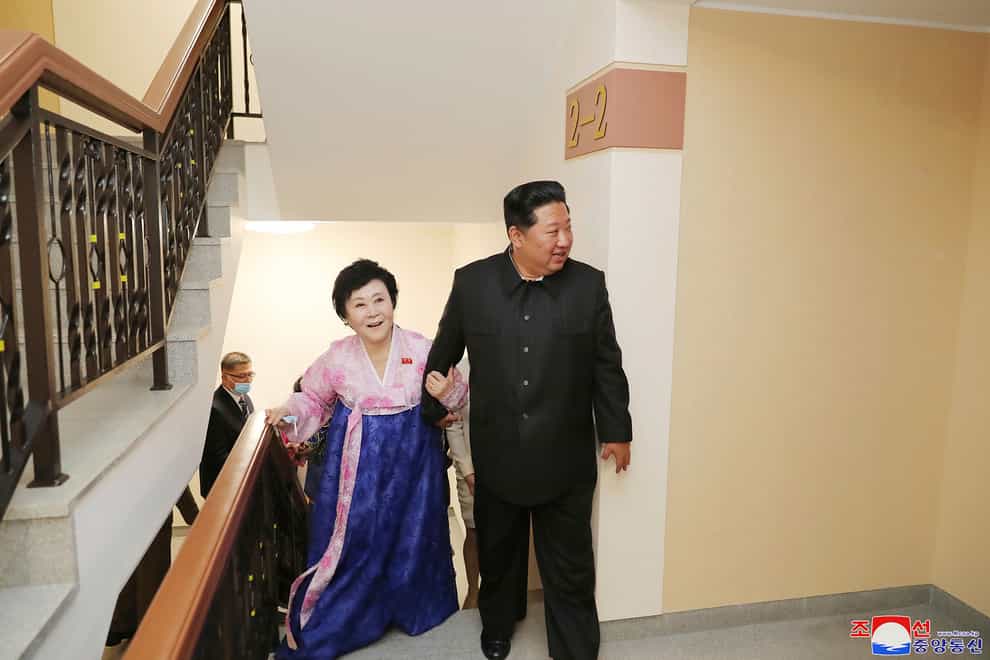 Kim Jong Un visits the new house of Korean Central Broadcasting announcer Ri Chun Hi after attending an inauguration ceremony of Pothong riverside terraced residential district in Pyongyang, North Korea (Korean Central News Agency/Korea News Service via AP)