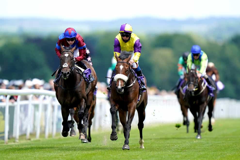 Dark Moon Rising ridden by Shane Gray (centre) on their way to winning the Pure Broadband EBF Maiden Stakes at Beverley (Tim Goode/PA)