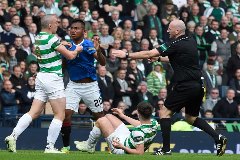 Scott Brown and Alfredo Morelos clash during the most recent Celtic-Rangers semi-final (Ian Rutherford/PA)