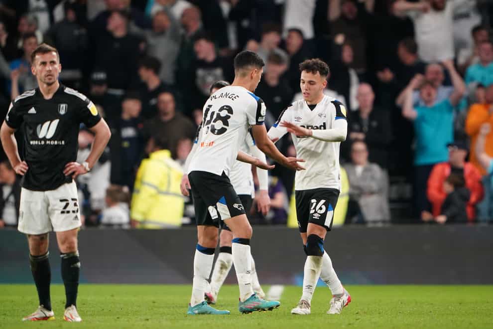 Derby County’s Luke Plange celebrates an own goal by Fulham’s Tosin Adarabioyo (Zac Goodwin/PA)