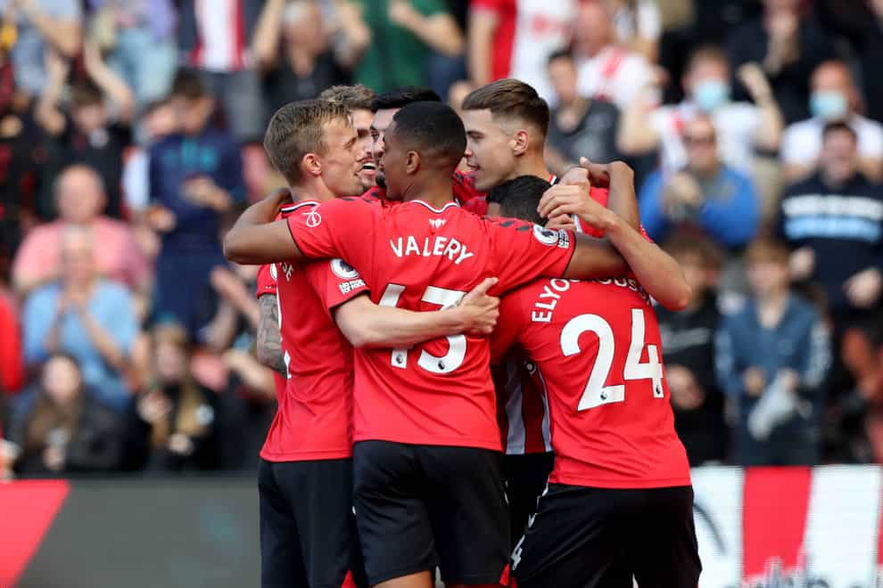 Jan Bednarek (second right) is congratulated by his Southampton team-mates (Kieran Cleeves/PA)