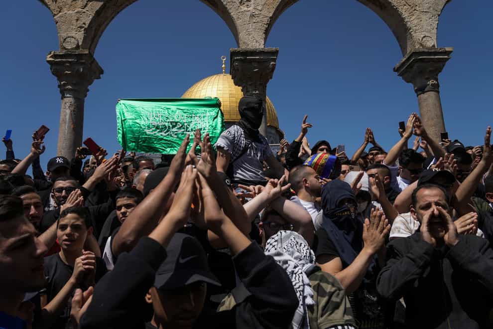 Two days after clashes Israeli police have entered a sensitive Jerusalem holy site and arrested at least two Palestinians (Mahmoud Illean/AP)
