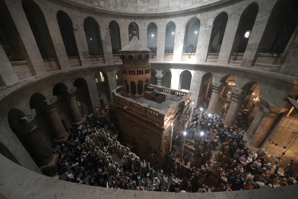 Orthodox Christians mark Palm Sunday at the Church of the Holy Sepulchre (Oded Balilty/AP)