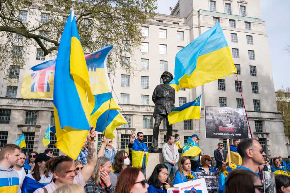 People take part in a demonstration against the Russian invasion of Ukraine outside Downing Street (Dominic Lipinski/PA)