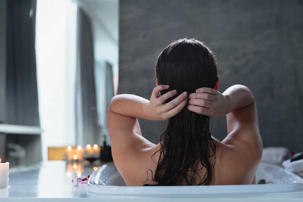 Should you skip the shampoo if you’re having a bath? (Alamy/PA)