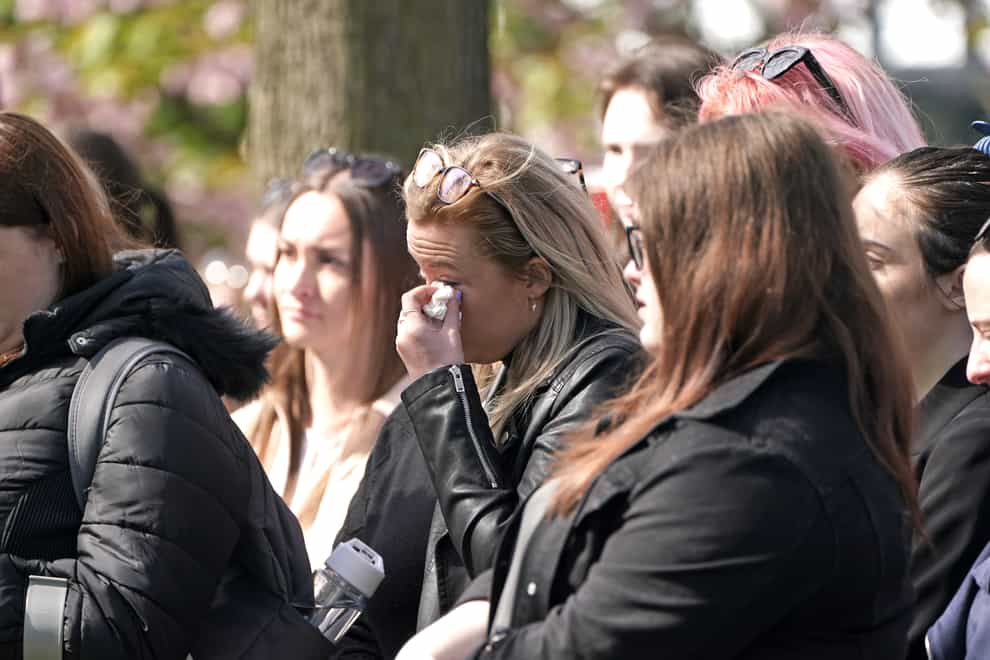 Mourners outside St Francis of Assisi church in Petts Wood, London, during the funeral of The Wanted star Tom Parker (Kirsty O’Connor/PA)