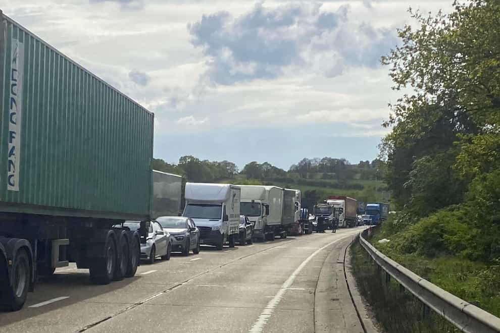 Handout photo courtesy of Dave Dewdney Photography of vehicles stuck on the M25 motorway after an accident where cooking oil has been spilt between junctions 24 and 25. Picture date: Tuesday April 19, 2022.