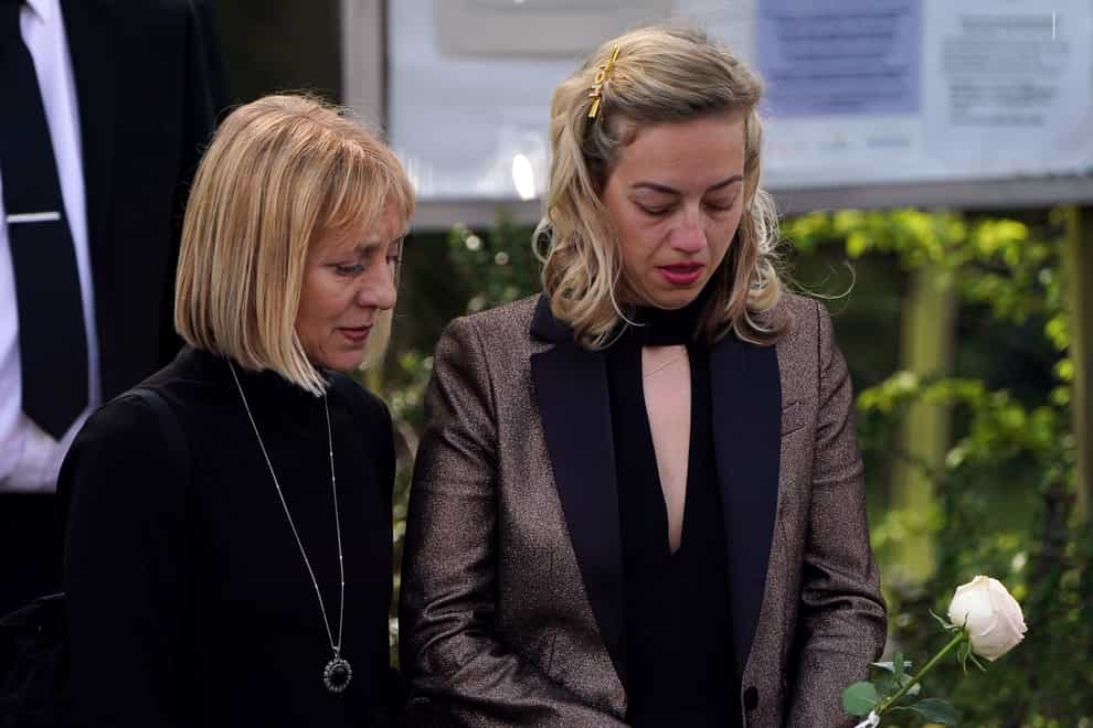 Kelsey Parker (right) at the funeral of her husband Tom (Kirsty O’Connor/PA)