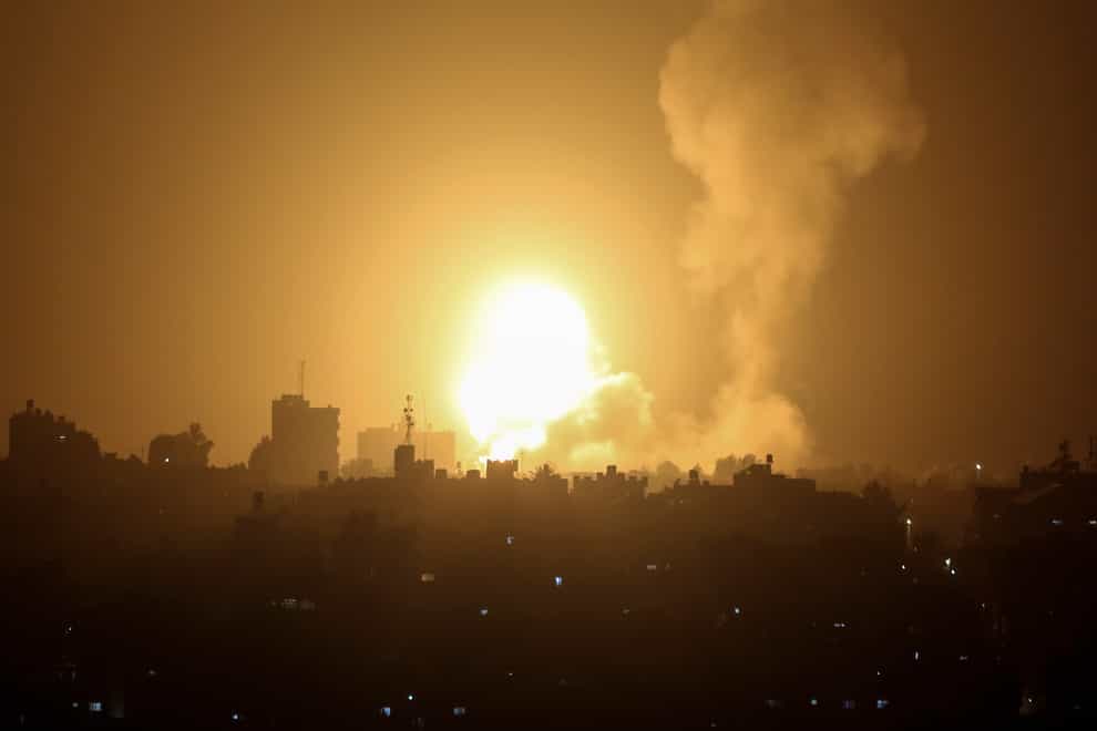 An explosion is caused by Israeli airstrikes on a Hamas military base in town of Khan Younis, southern Gaza Strip (Yousef Masoud/AP)