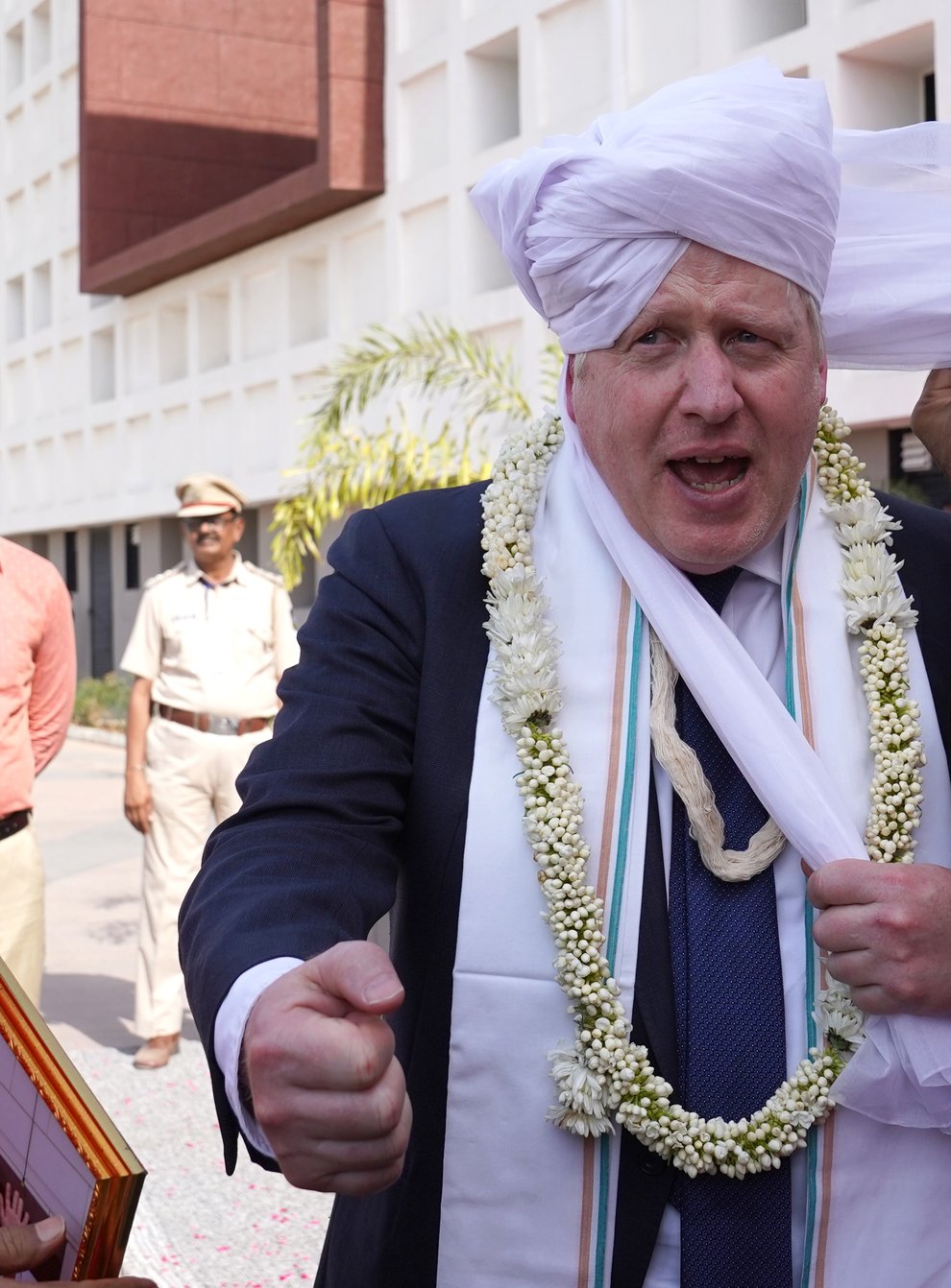 Prime Minister Boris Johnson wearing a turban at Gujarat bio technology University (Stefan Rousseau/PA)