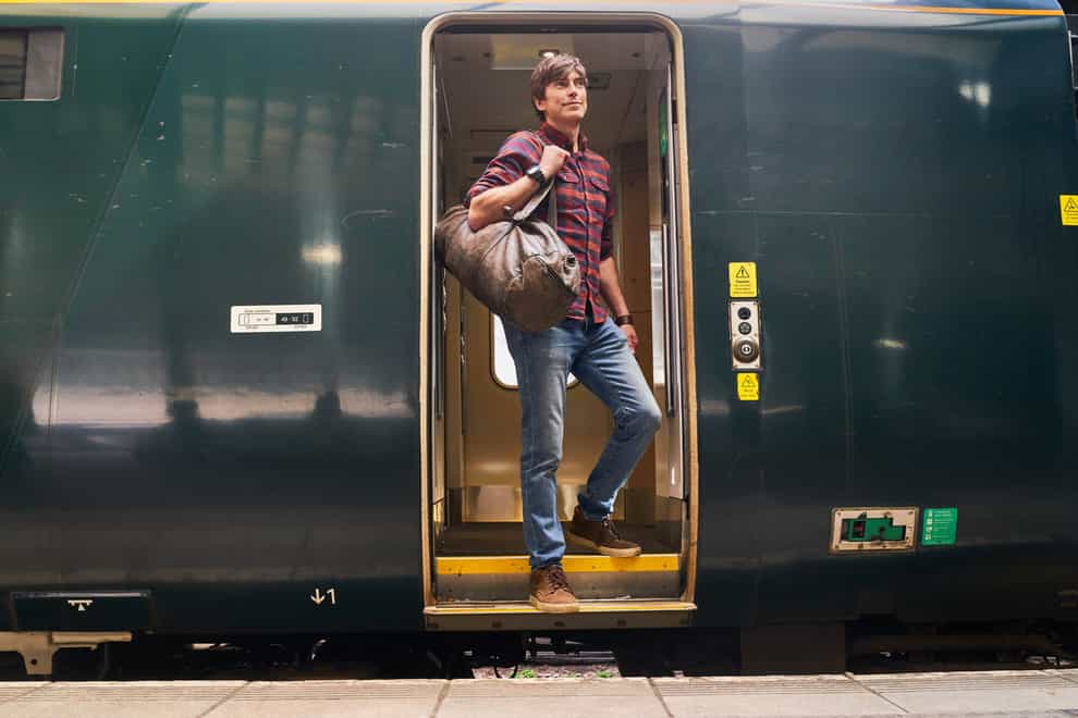 Simon Reeve is helping champion UK train travel (Simon Jacobs/PA)
