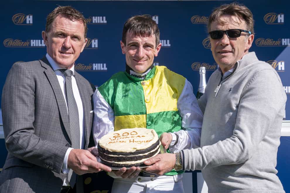 Brian Hughes with fellow members of the 200 club AP McCoy (left) and Peter Scudamore (Jane Barlow/PA)
