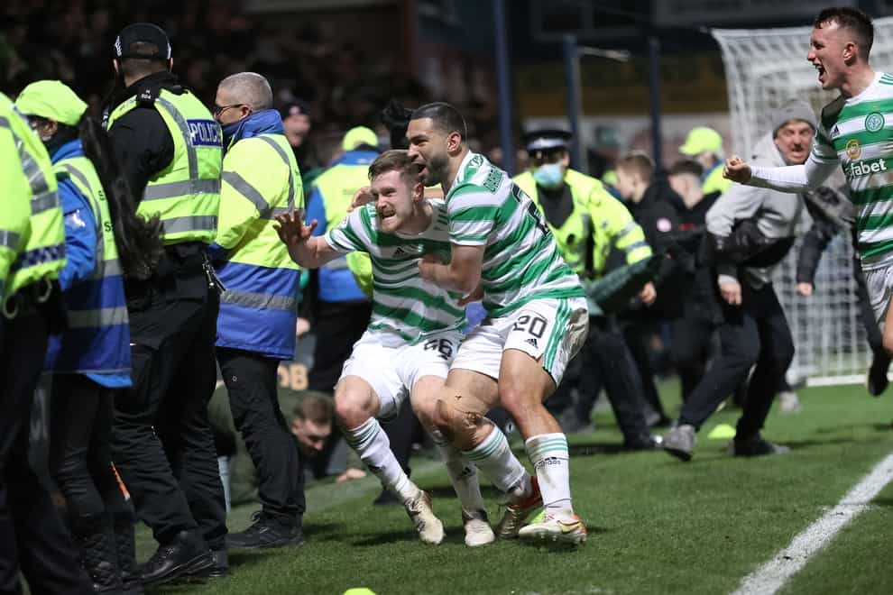 Celtic’s Anthony Ralston (left) celebrates in Dingwall (Steve Welsh/PA)
