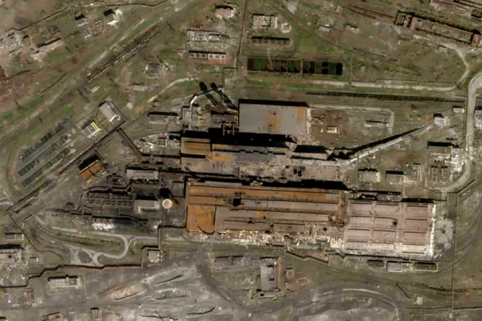 The Azovstal Steel plant in Mariupol, with large holes blasted in the roof (Planet Labs/AP)