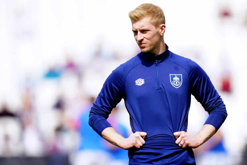 Burnley captain Ben Mee, recovering from a knee problem, is also part of the club’s interim coaching staff (Adam Davy/PA)